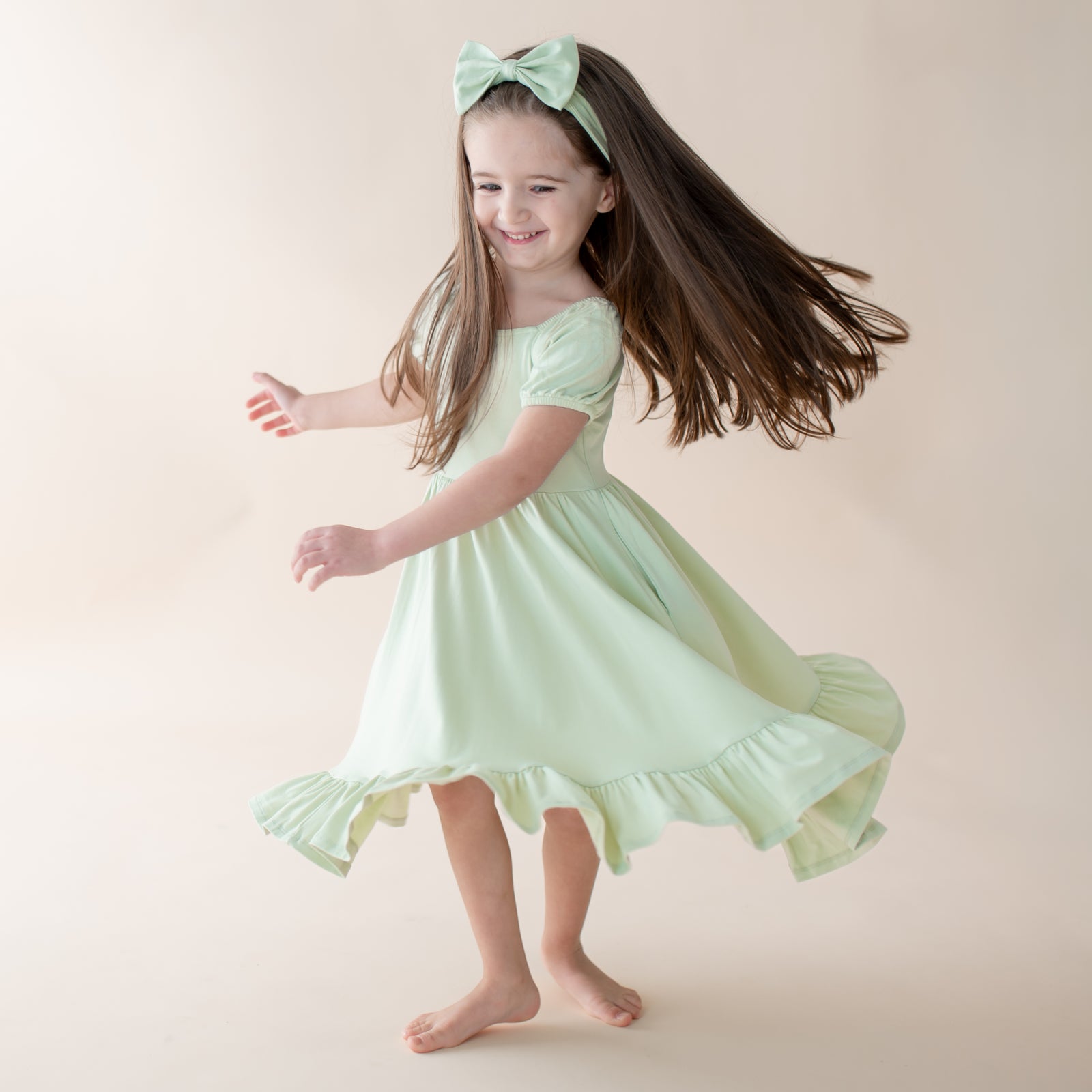 Puff Sleeve Twirl Dress in Basil - Image 4