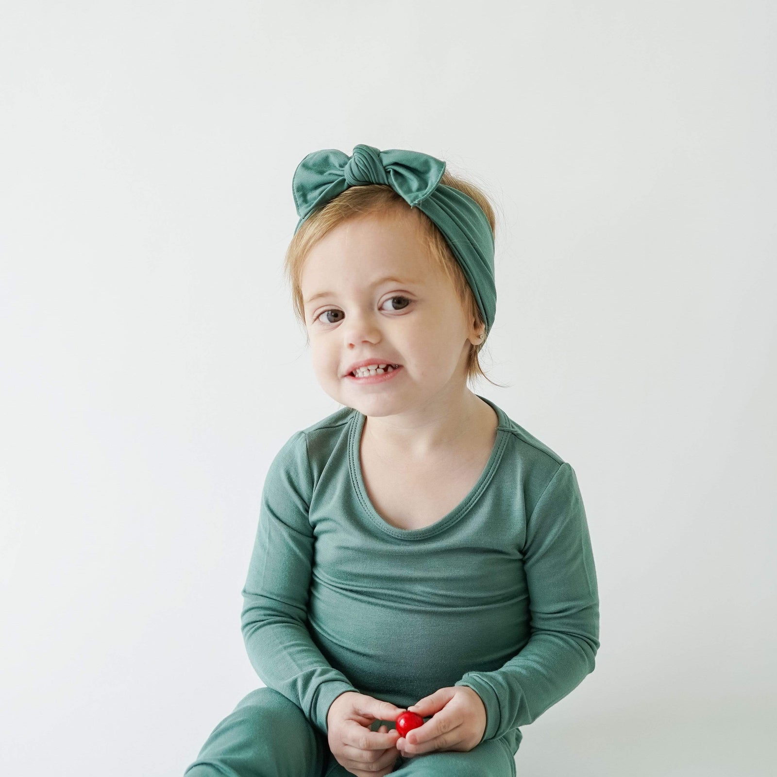 Knotted Bow Headband in Pine - Image 3