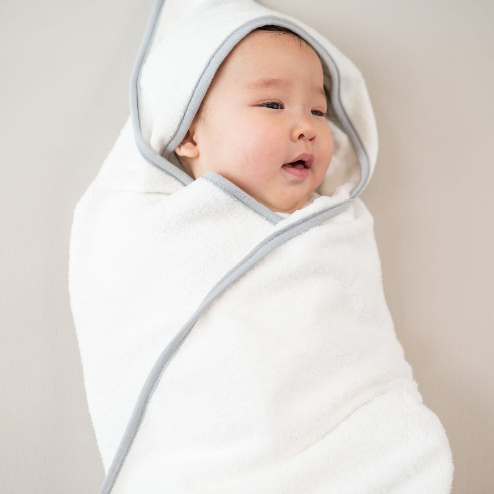 Hooded Bath Towel in Cloud with Storm Trim - Image 3